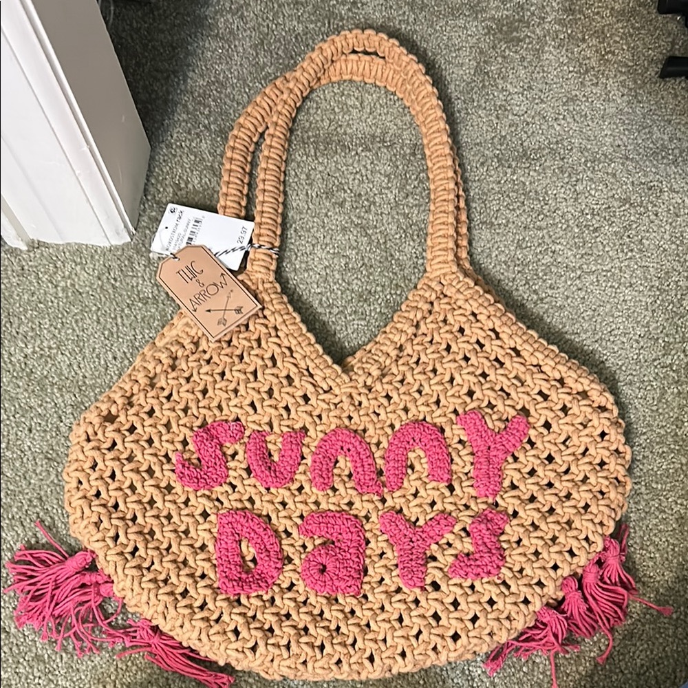Twig and Arrow Tan and Pink Woven Tote Bag with Fringe beach